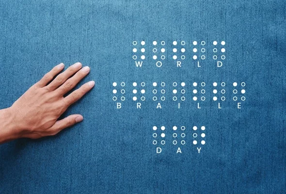 hand-reading-braille-blue-background-600nw-2400531781